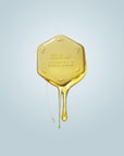 Photo of Scent Coin covered in honey